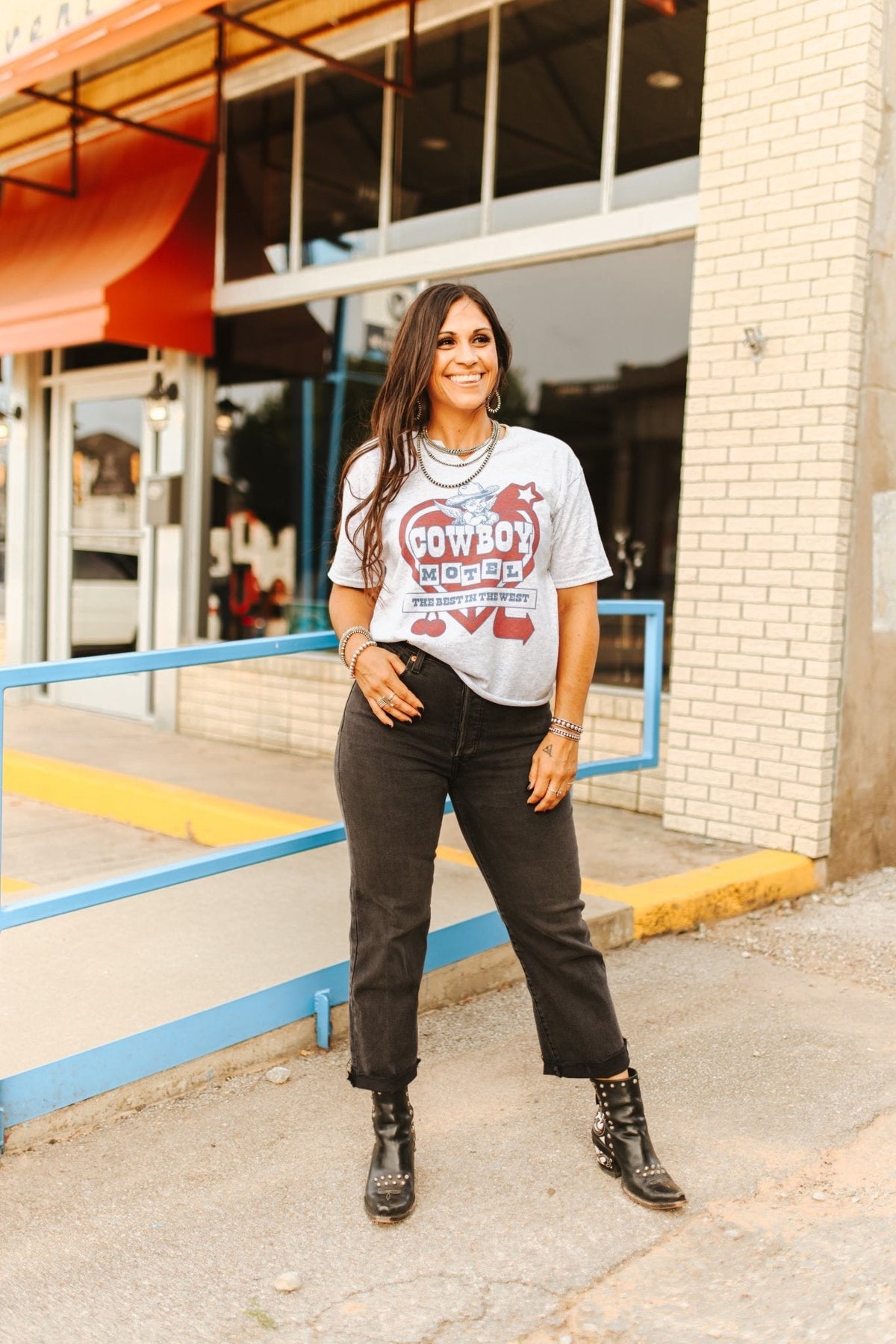 Cowboy Motel Raw Cut V-neck Graphic Tee